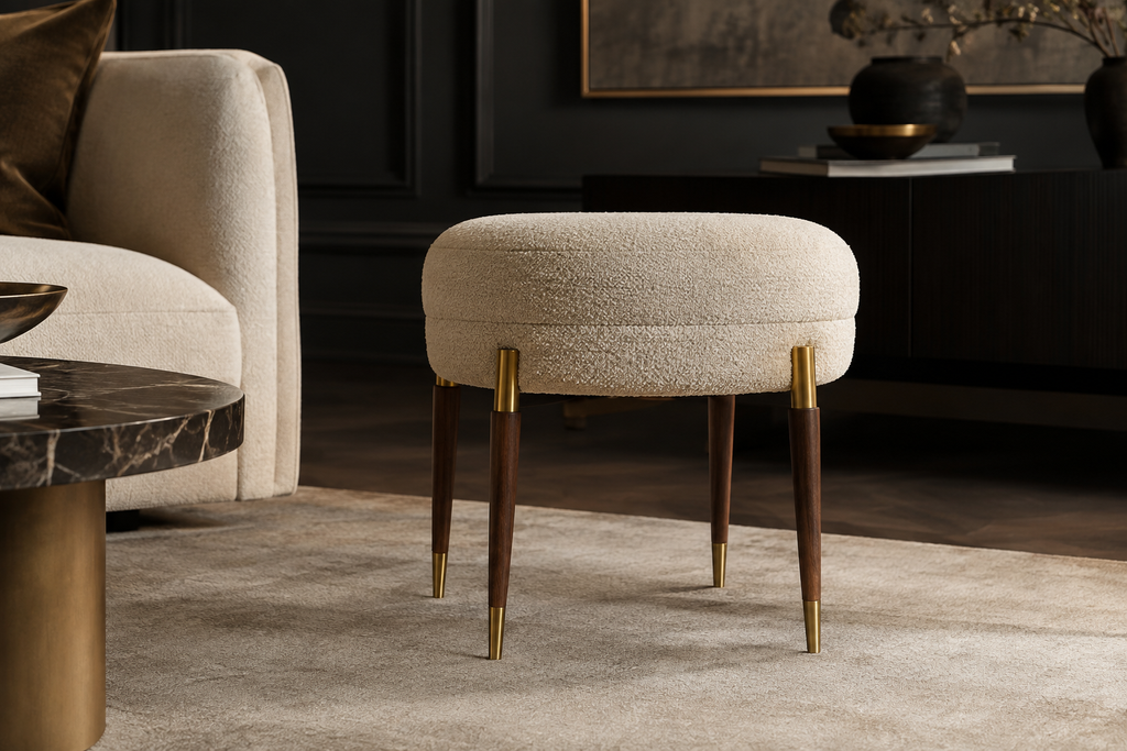 Ivory boucle accent stool in a refined living room